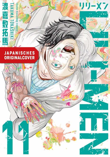 „JAPANISCHES ORIGINALCOVER“: Ein Mann mit bemaltem Gesicht hält ein buntes Baby, lebendige Farben im Hintergrund.