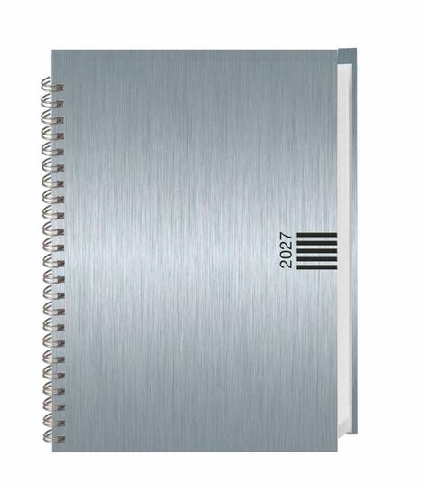 „2027“ steht neben einem Barcode auf einem metallisch glänzenden Spiralnotizbuch.