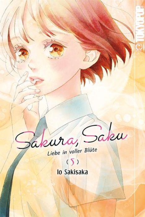 „Sakura, Saku: Liebe in voller Blüte (5)“ von Io Sakisaka, TOKYOPOP. Illustration eines Mädchens mit nachdenklichem Blick.