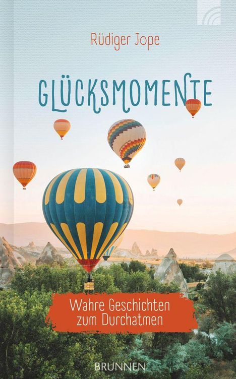 "Glücksmomente" von Rüdiger Jope, mit Untertitel "Wahre Geschichten zum Durchatmen". Mehrere Heißluftballons über grüner Landschaft.