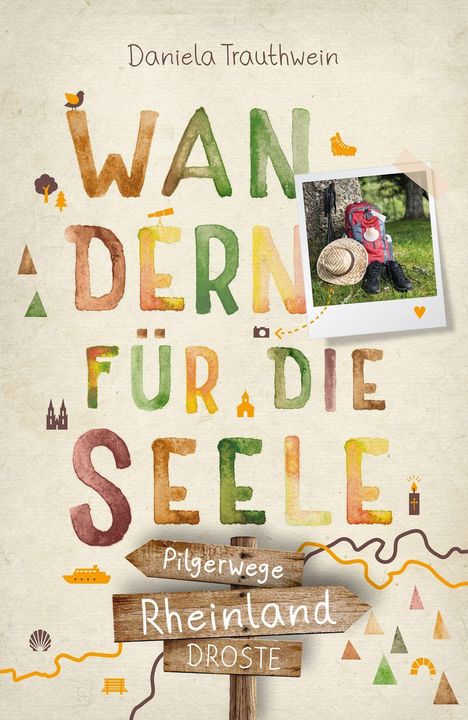 "Daniela Trauthwein: Wandern für die Seele. Pilgerwege Rheinland. Foto: Rucksack, Hut, Wanderstiefel an einem Baum."