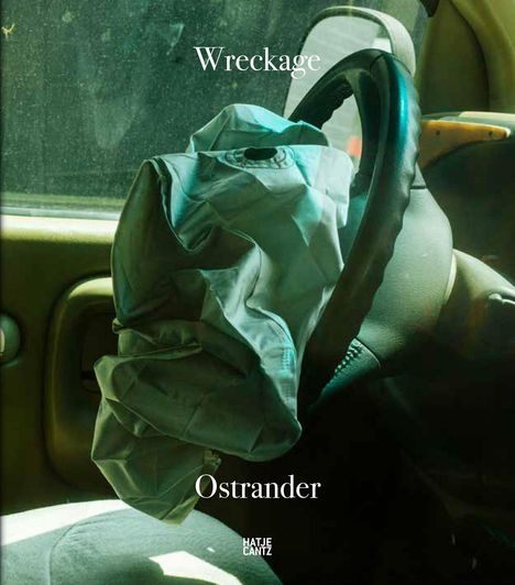 Text: "Wreckage, Ostrander, HATJE CANTZ". Ein geöffneter Airbag im Inneren eines Autos lenkt den Fokus.