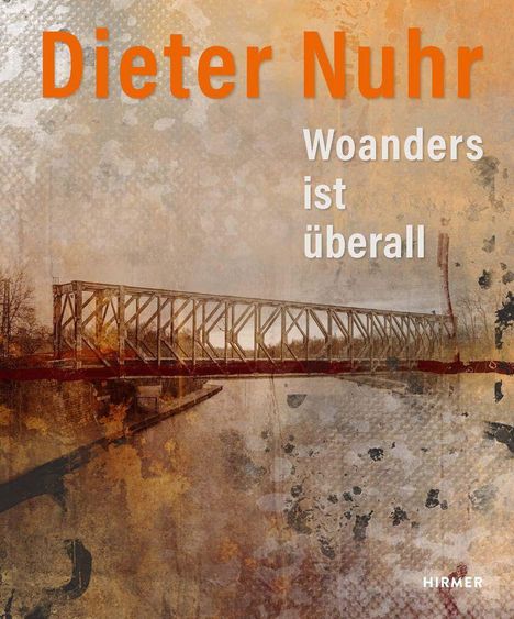 Dieter Nuhr: Woanders ist überall. Eine Brücke über einem Fluss, in warmen, erdigen Farbtönen.
