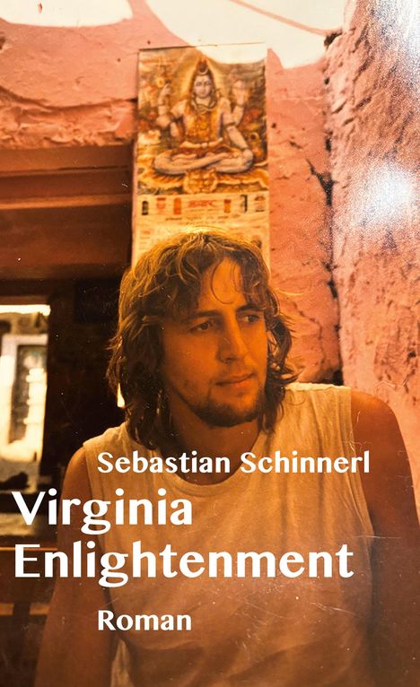 Sebastian Schinnerl: Virginia Enlightenment, Roman. Ein Mann mit Bart in einem Raum, dahinter eine Hindu-Gottheit an der Wand.