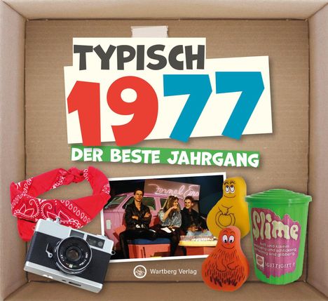 "Typisch 1977, der beste Jahrgang." Dekor mit Kamera, Foto, rotem Halstuch, Knete-Eimer und gelben Figuren.