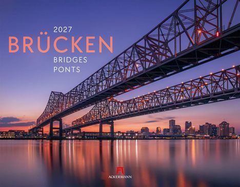 2027 BRÜCKEN, BRIDGES, PONTS. Eine beleuchtete Brücke vor einer Stadt-Silhouette im Abendlicht. Text unten: ACKERMANN.