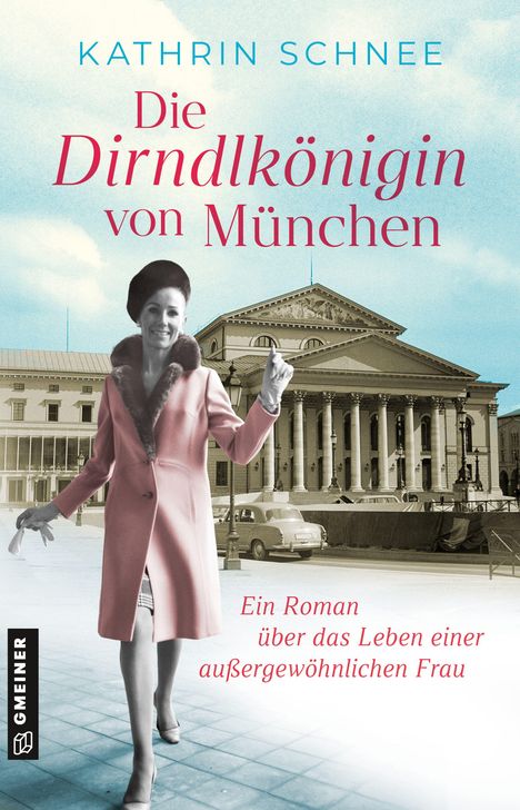 „Kathrin Schnee: Die Dirndlkönigin von München. Ein Roman über das Leben einer außergewöhnlichen Frau.“ Frau im Mantel vor Gebäude.