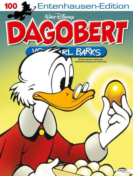 "Entenhausen-Edition: DAGOBERT von Carl Barks. Zeichentrickente im roten Anzug hält ein goldenes Ei strahlend hoch."