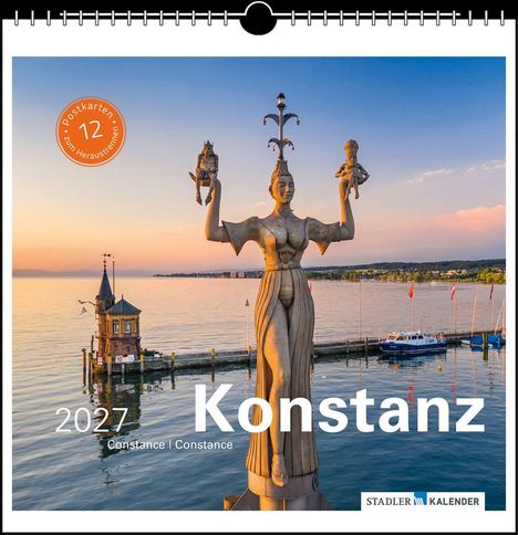 12 Postkarten zum Herausnehmen. Konstanz 2027. Große Statue am Wasser, Sonnenuntergang im Hintergrund.