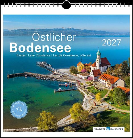 "Östlicher Bodensee 2027. Eastern Lake Constance. Foto eines Hafens mit Kirche und bunten Häusern am Wasser."