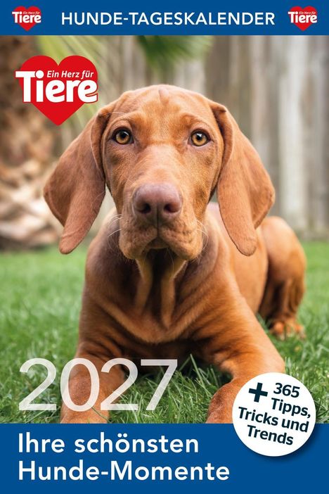 Hun­de-Ta­ges­ka­len­der 2027, Ihre schönsten Hunde-Momente. Ein Hund liegt auf Gras im Freien. Oben das Logo "Ein Herz für Tiere".