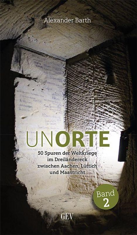 "Alexander Barth, UNORTE: 50 Spuren der Weltkriege im Dreiländereck Aachen, Lüttich, Maastricht, Band 2. Höhlenwand mit Schrift."