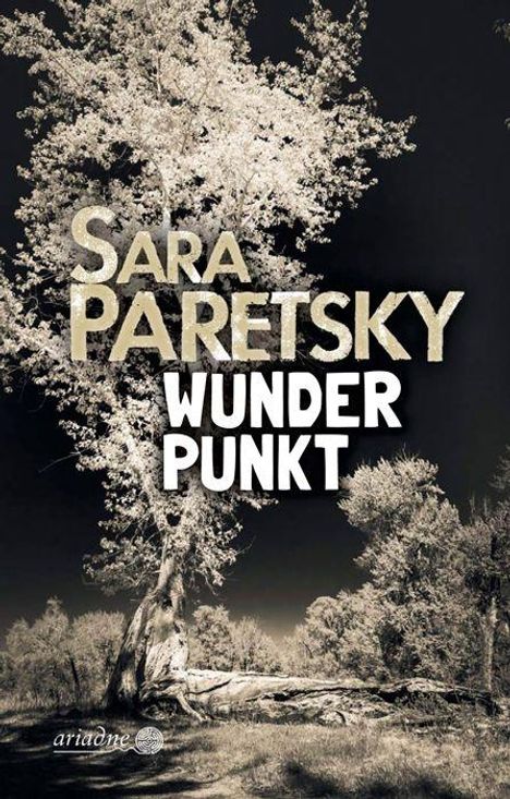 "Sara Paretsky WUNDER PUNKT" steht in großen Buchstaben. Ein großes, eindrucksvolles Baum-Motiv dominiert den Hintergrund.