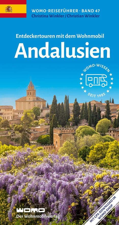 "Andalusien: Entdeckertouren mit dem Wohnmobil" zeigt ein idyllisches spanisches Landschaftsbild mit blühenden Bäumen.
