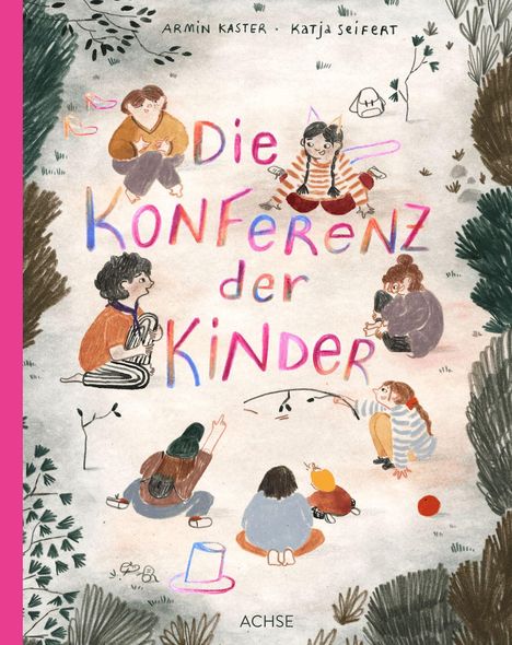 "Die Konferenz der Kinder" in großen bunten Buchstaben. Kinder sitzen im Kreis auf dem Boden, umgeben von Bäumen.