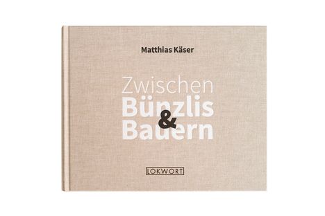 "Zwischen Bünzlis & Bauern" ist der Buchtitel von Matthias Käser. Unten steht "LOKWORT" in einem schlichten Design.