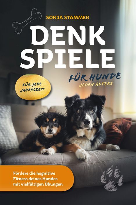 Buchtitel: "Denkspiele für Hunde". Text: "Für jede Jahreszeit", "Jeden Alters". Zwei Hunde auf einem Sofa.