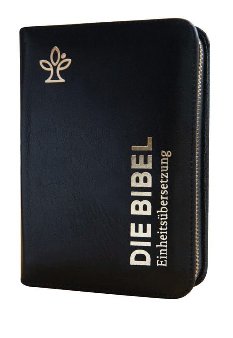„DIE BIBEL Einheitsübersetzung“ steht vertikal auf einem schwarzen Ledereinband mit einem symbolischen Pflanzenlogo.