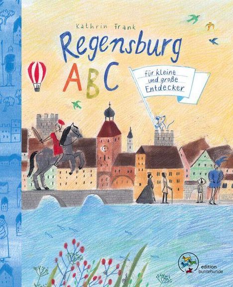 "Kathrin Frank Regensburg ABC, für kleine und große Entdecker." Eine bunte Illustration einer Stadtansicht mit Heißluftballon.