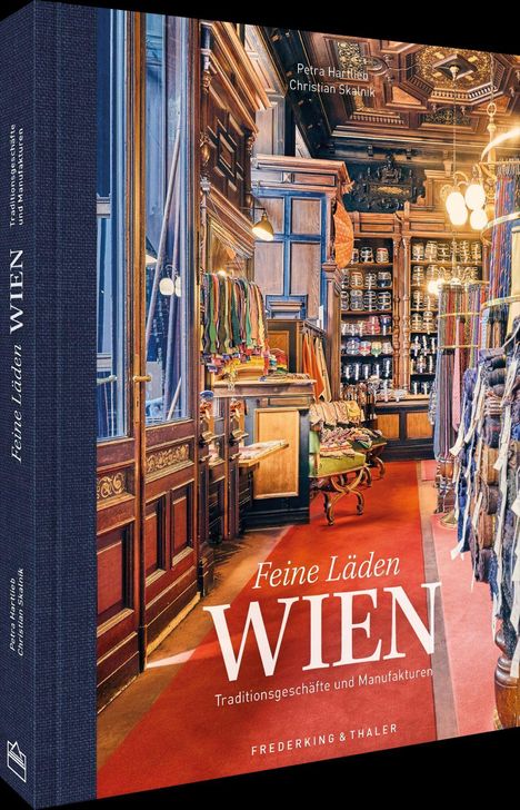 Buchcover "Feine Läden Wien: Traditionsgeschäfte und Manufakturen". Eine elegante, traditionsreiche Ladenansicht.