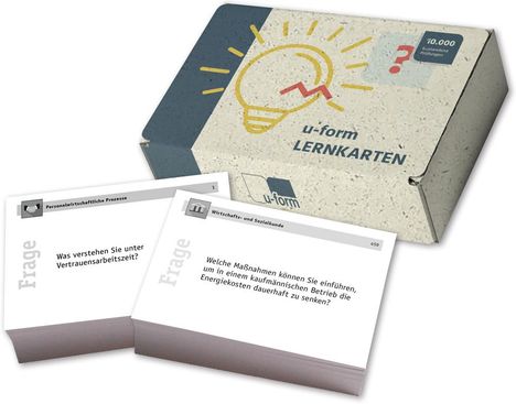 Box mit der Aufschrift "u-form LERNKARTEN" und Karten. Fragen wie "Was verstehen Sie unter Vertrauensarbeitszeit?"
