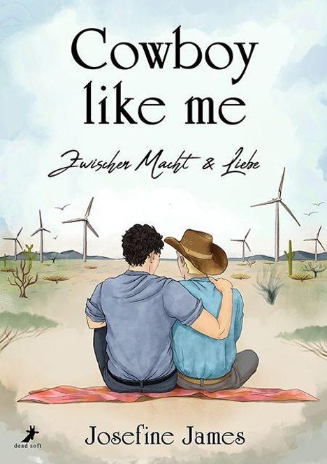 "Cowboy like me. Zwischen Macht & Liebe. Josefine James." Zwei Personen sitzen in einer Wüstenlandschaft mit Windrädern.