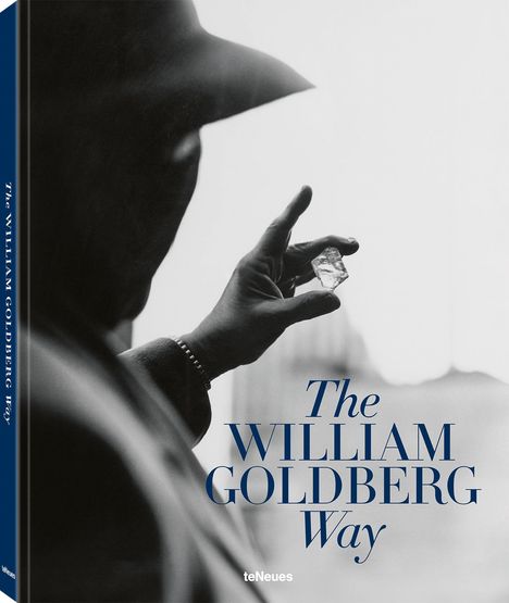 Text: "The William Goldberg Way". Ein Mann im Schatten hält einen großen Rohdiamanten in der Hand.