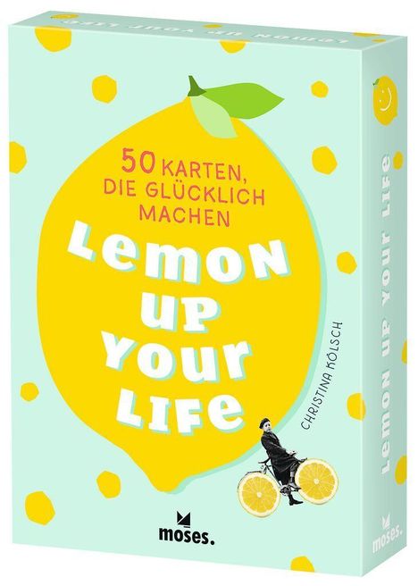 Text: "50 Karten, die glücklich machen. Lemon Up Your Life. Christina KÖLSCH. moses." Gelbes Zitrusmotiv, fröhliches Design.