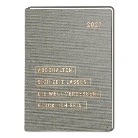 Kalender mit den Texten: "ABSCHALTEN. SICH ZEIT LASSEN. DIE WELT VERGESSEN. GLÜCKLICH SEIN." und "2027". Grauer Einband.