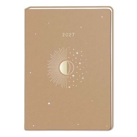 Ein beige Notizbuch mit "2027" und einem stilisierten Sonnen- und Mond-Design in der Mitte.