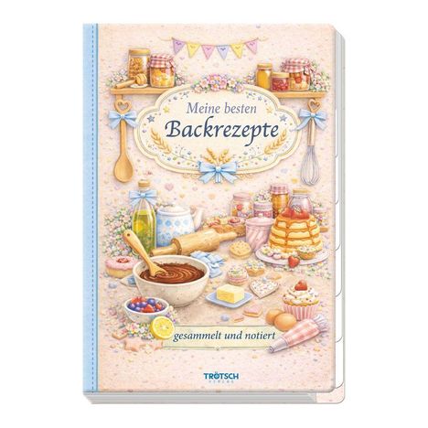 "Meine besten Backrezepte", dekoriert mit Backutensilien, Teig und Gebäck auf einem Tisch.