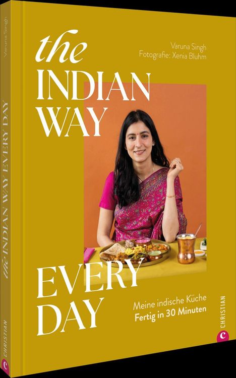 „the INDIAN WAY EVERY DAY, Meine indische Küche Fertig in 30 Minuten.“ Frau in Sari mit Thali-Gericht.