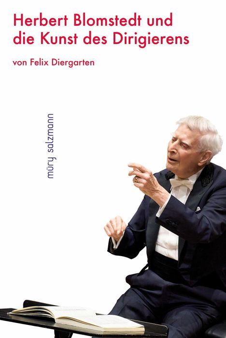 "Herbert Blomstedt und die Kunst des Dirigierens von Felix Diergarten." Ein älterer Mann dirigiert mit ausdrucksstarker Pose.