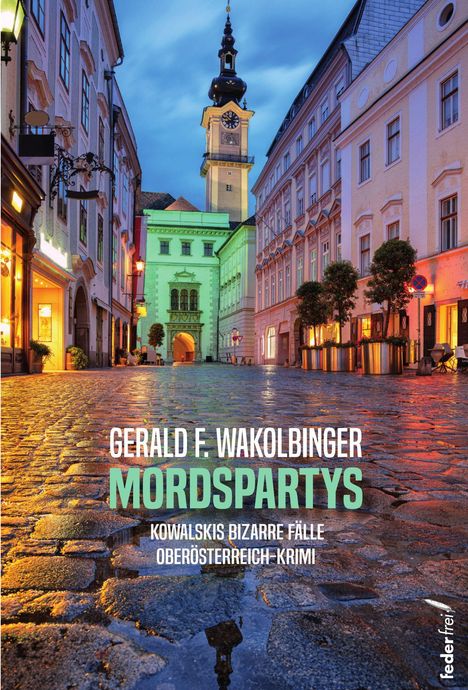 Text: „Gerald F. Wakolbinger Mordspartys, Kowalskis bizarre Fälle, Oberösterreich-Krimi.“ Pflasterstraße in Altstadt bei Dämmerung.