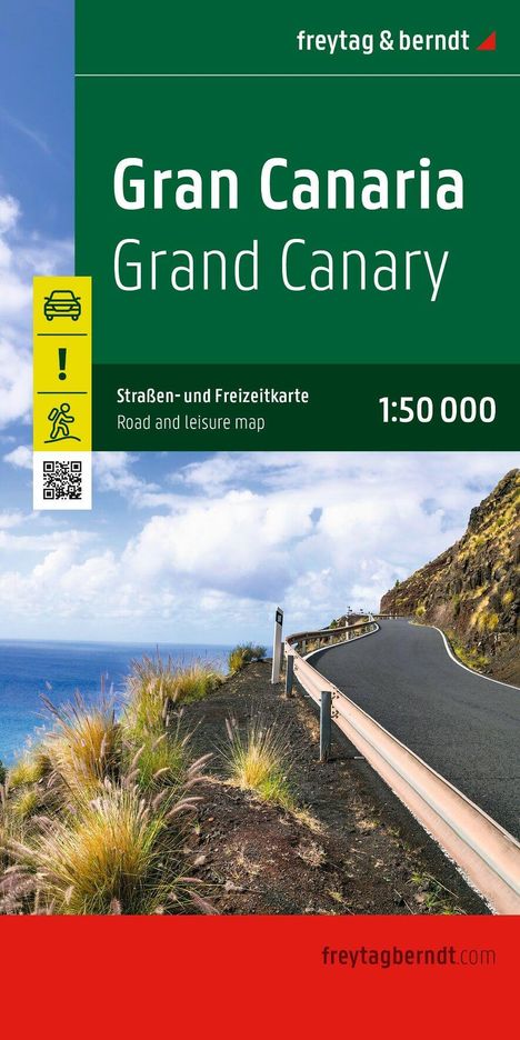 Gran Canaria, Straßen- und Freizeitkarte, 1:50 000. Küstenlandschaft mit einer kurvigen Straße und blauem Himmel.