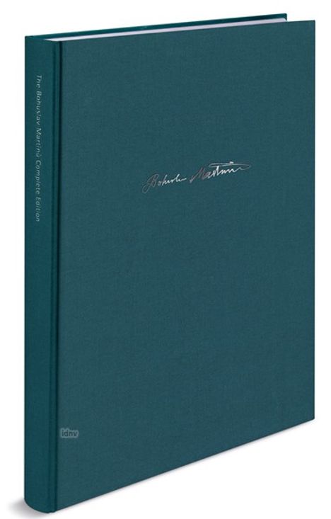 „The Behavior of Mixed Connective Tissue“ steht am Buchrücken. Künstlerische Signatur auf blauem Buchcover.