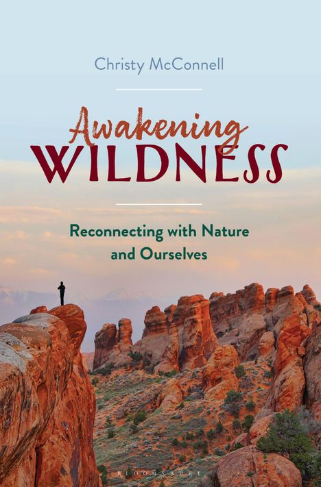 Text: "Christy McConnell", "Awakening Wildness", "Reconnecting with Nature and Ourselves". Rote Felsenlandschaft und Person.