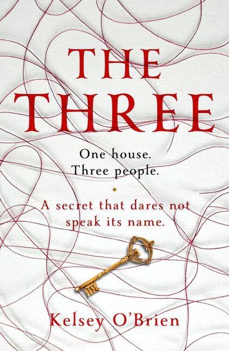 Texte: "THE THREE", "One house. Three people.", "A secret that dares not speak its name.", "Kelsey O'Brien". Linienmuster, goldener Schlüssel.