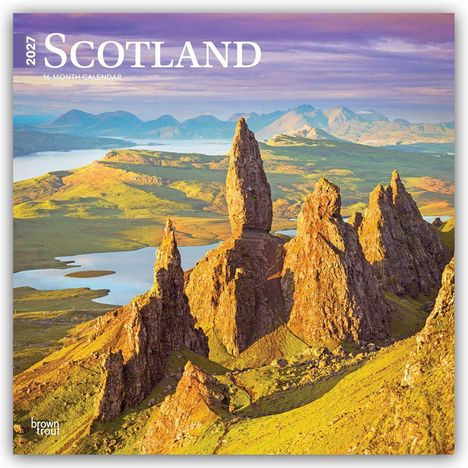 Text: "2027 Scotland, 16-Month Calendar". Naturaufnahme mit markanten, felsigen Gipfeln und grünen Tälern bei Sonnenuntergang.