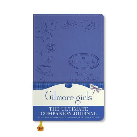 "Gilmore girls: The Ultimate Companion Journal" in Blau mit Blatt-, Blume- und Kaffeetasse-Motiven, Libellen-Logo.