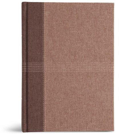 Kein Text ist vorhanden. Ein braunes Notizbuch mit Stoffeinband und hellen Ziernähten in der Mitte.