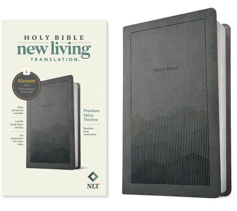 Texte: "Holy Bible", "new living translation", "filament APP", "Premium Value Thinline", "NLT". Ein schwarzgraues Buch mit Prägung.