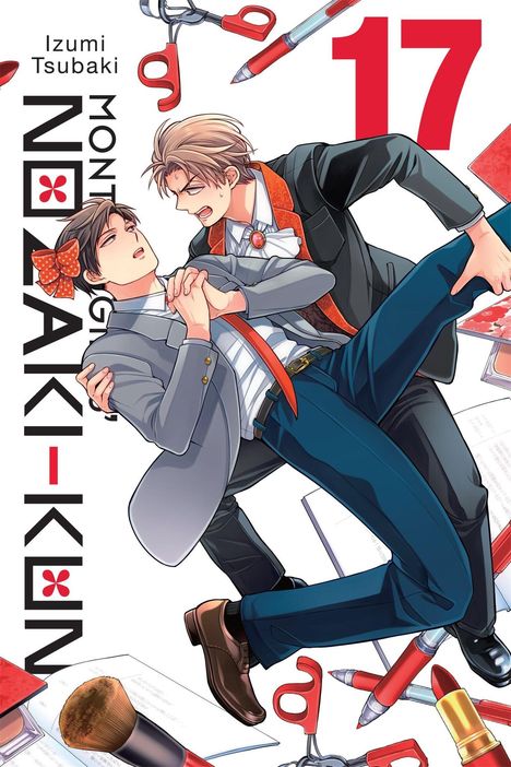 „Izumi Tsubaki“, „Monthly Nozaki-kun“, „17“. Zwei gezeichnete Männer in Anzügen; um sie Makeup und Schreibutensilien.