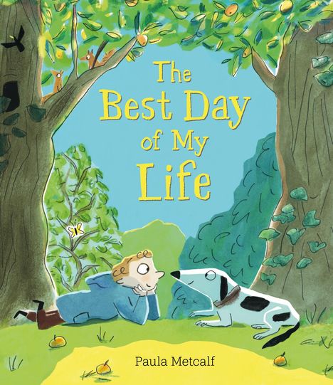 Text: "The Best Day of My Life" und "Paula Metcalf". Illustration: Ein Kind und ein Hund liegen glücklich unter Bäumen.