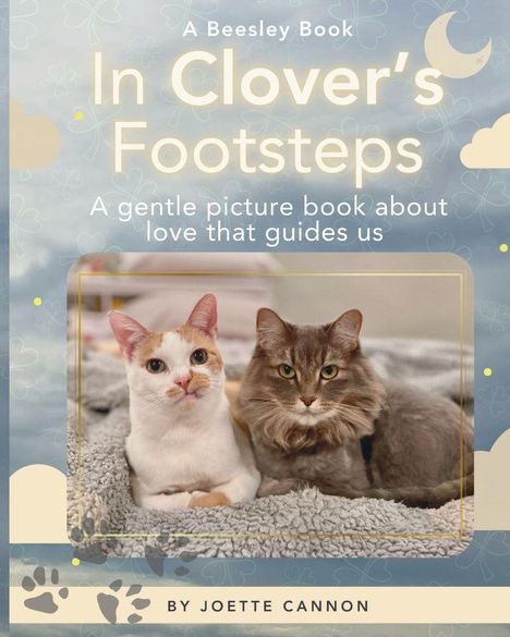 „In Clover’s Footsteps“ ist ein sanftes Bilderbuch über Liebe. Zwei Katzen liegen zusammen auf einer Decke.