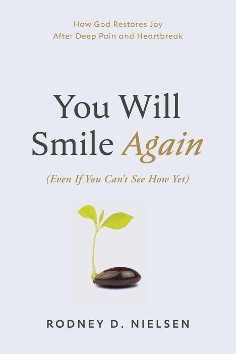 "You Will Smile Again" – darüber ein Keimling aus einem Samen. Darunter: "Rodney D. Nielsen".