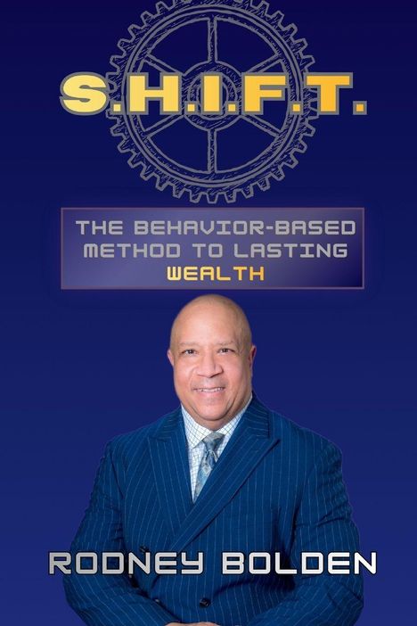 Text: "S.H.I.F.T.", "THE BEHAVIOR-BASED METHOD TO LASTING WEALTH", "RODNEY BOLDEN". Ein Mann in Anzug lächelt.