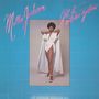 "Millie Jackson, Get it out’cha system." Frau in weißem Gewand, selbstbewusste Pose. Hintergrund: blaues Raster.