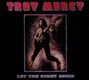 "TROY MERCY" oben, "LET THE NIGHT BEGIN" unten. Illustration: Person mit Gitarre in dynamischer Pose vor funkelndem Hintergrund.