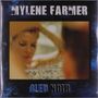 Oben der Text "MYLENE FARMER", unten "BLEU NOIR". Verschwommenes Bild einer Frau hinter einer Glasoberfläche.
